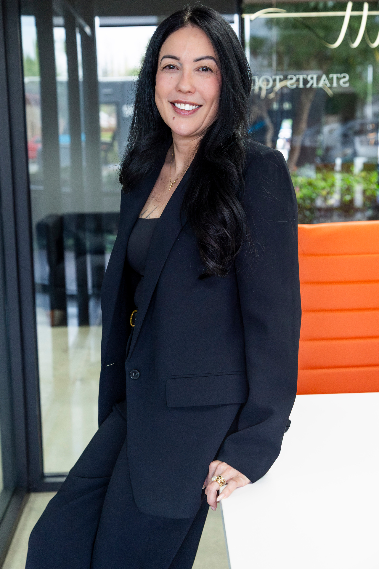 Escrow professional standing outside the office